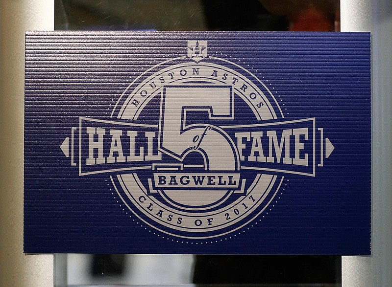 A sign adorns a podium from which former Houston Astros first baseman Jeff Bagwell, spoke to the media Wednesday, Jan. 18, 2017, in Houston. Bagwell was elected to baseball's Hall of Fame on Wednesday. 