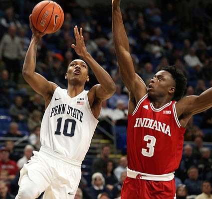 OG Anunoby of Indiana defends as Penn State's Tony Carr goes to the basket during Wednesday night's game in State College, Pa.
