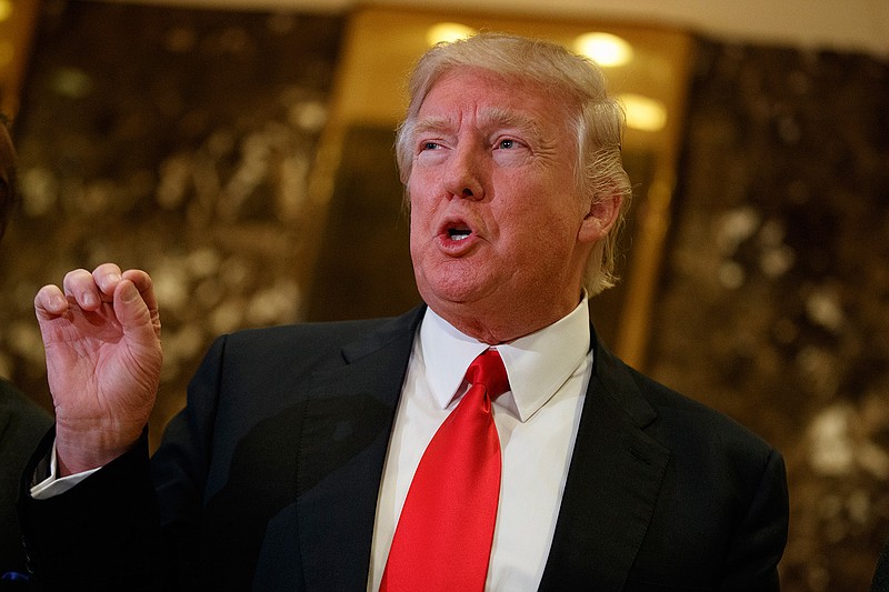 In this Jan. 13, 2017 file photo, President-elect Donald Trump speaks with reporters in the lobby of Trump Tower in New York. European leaders, anxious over Trump's unpredictability and coziness with the Kremlin, are scrambling to get face time with the new American president before he can meet with Russian President Vladimir Putin, whose provocations have set the continent on edge. 