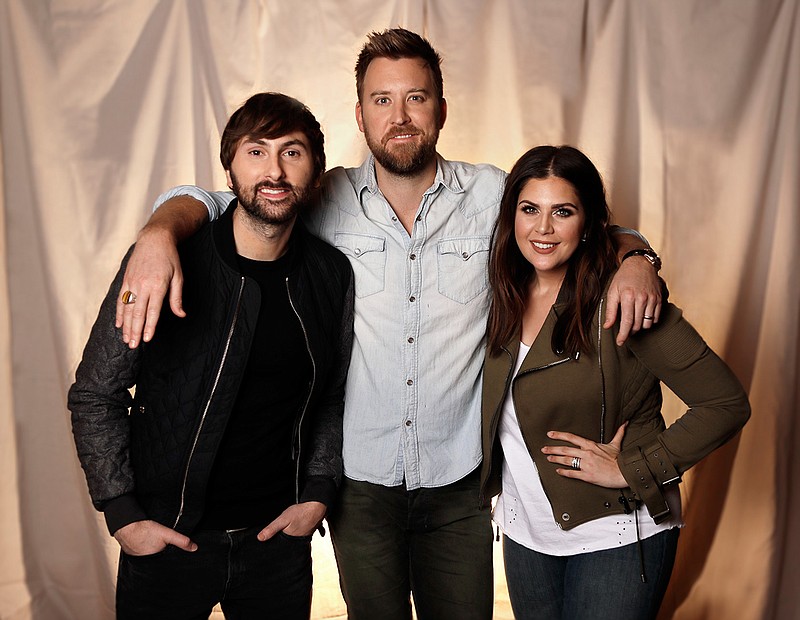InIn this Jan. 9, 2017, photo, the members of Lady Antebellum, from left, Dave Haywood, Charles Kelley and Hillary Scott pose in Nashville, Tenn. The Grammy-winning vocal group released a new single, "You Look Good," Thursday, Jan. 19, from their forthcoming album "Heart Break," which comes out on June 9. 
