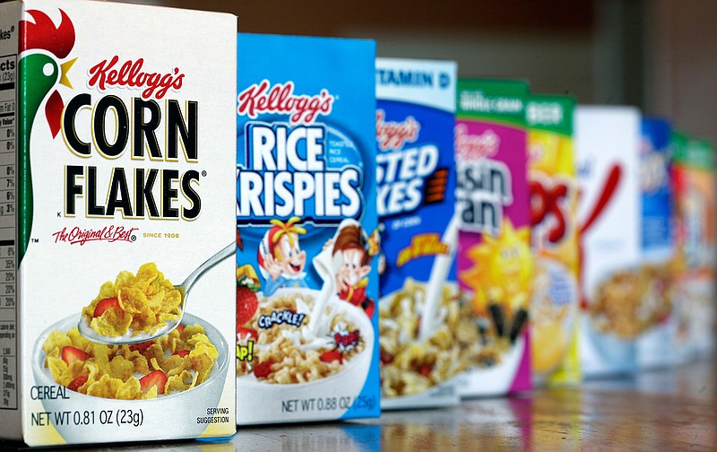 This Feb. 1, 2012, file photo shows Kellogg's cereal products in Orlando, Fla. Cereal makers have paid for studies that support the belief that eating breakfast can help keep us thin. The fact that cereal makers commissioned the studies doesn't mean breakfast is unhealthy, but it shows how difficult it can be to sort the hype from reliable dietary advice. 