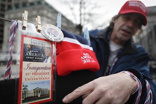 Vendors sell their President-elect Donald Trump wares in Washington, Thursday, Jan. 19, 2017, as preparations continue for Friday's presidential inauguration.