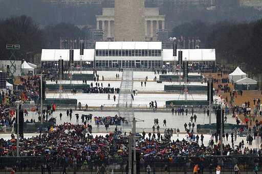 The crowd starts to fill in along the National Mall before the swearing in of Donald Trump as the 45th president of the Untied States during the 58th Presidential Inauguration at the U.S. Capitol in Washington. Friday, Jan. 20, 2017