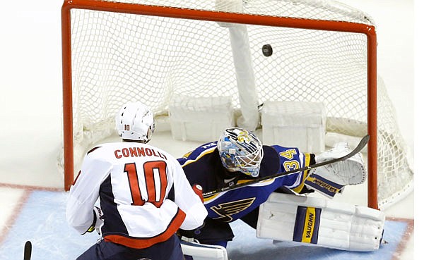Brett Connolly of the Capitals scores past Blues goalie Jake Allen during the second period of Thursday night's game in St. Louis.
