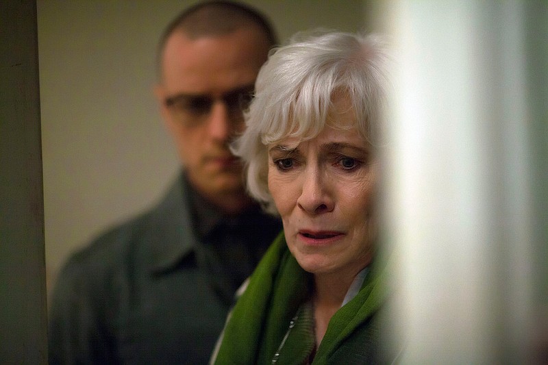 This image released by Universal Pictures shows James McAvoy, left, and Betty Buckley in a scene from, "Split." 