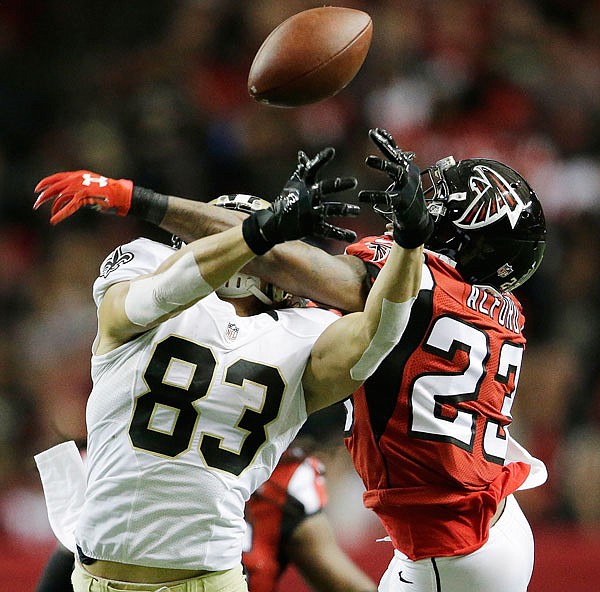 In this Jan. 3, 2016, file photo, Falcons cornerback Robert Alford (right) breaks up a pass intended for Saints wide receiver Willie Snead during a game in Atlanta. The defenses will surely be tested when the Packers meet the Falcons in the NFC championship game.