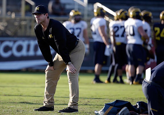 Camps such as the one coach Jim Harbaugh and Michigan had in Florida last spring have been banned by the NCAA.