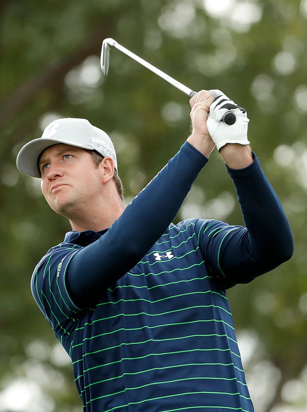 Hudson Swafford watches his tee shot on the sixth hole during the final round Sunday of the CareerBuilder Challenge on the Stadium Course at PGA West in La Quinta, California.