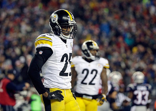 Steelers cornerback Artie Burns looks down after Patriots wide receiver Julian Edelman scored a touchdown during the second half of Sunday's AFC championship game in Foxborough, Massachusetts.