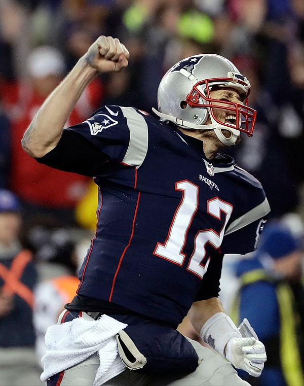 Patriots quarterback Tom Brady reacts after throwing a touchdown pass to Julian Edelman during the second half of Sunday's AFC championship game against the Steelers in Foxborough, Massachusetts.