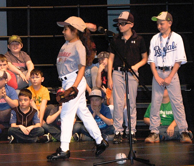 Fiona - Camelia Castro - makes a success of her pitching debut after convincing the coach to let her pitch in "It's a Hit".