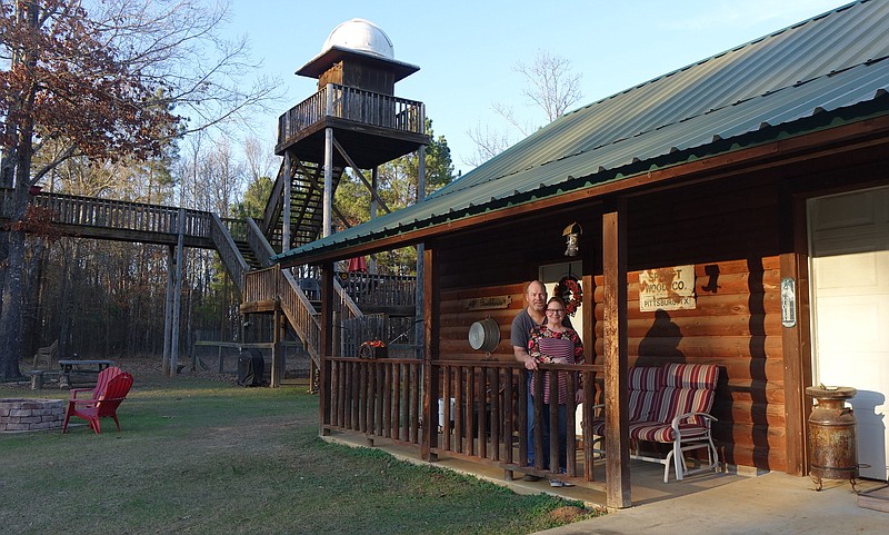 Owners Mike and Staci Wilder are happily building their WilderNest Ranch Bed and Breakfast in the far northwest corner of Cass County. They are pictured on the porch of the bunkhouse, which sleeps up to eight guests.