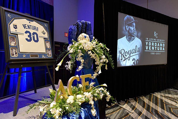 Flowers, images and a jersey are among the items at the front of the room where Royals pitcher Yordano Ventura was remembered by members and employees of the team in Kansas City. Ventura died in a car crash Sunday in the Dominican Republic.