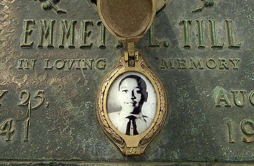 In this May 4, 2005 file photo, Emmett Till's photo is seen on his grave marker in Alsip, Ill. The FBI announced Wednesday, May 4, 2005, that Till's body will be exhumed to conduct an autopsy, which was never performed, and determine the cause of death. 