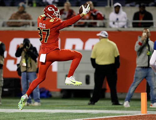 AFC tight end Travis Kelce of the Chiefs jumps into the end zone for a touchdown during Sunday night's Pro Bowl in Orlando, Fla.