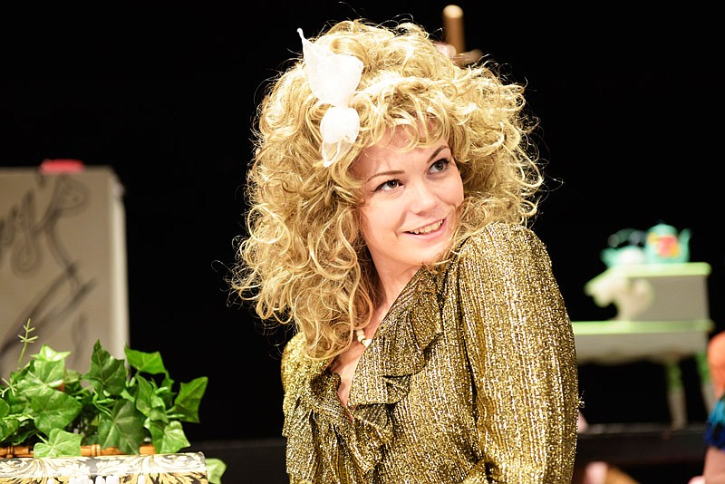 Truvy (Tylee Ciolli) smiles as she welcomes people into her store Monday during a dress rehearsal of Steel Magnolias at the Miller Performing Arts Center in Jefferson City.