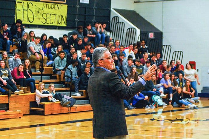 Former MU athletic director Mike Alden  addresses students at Fulton High School.