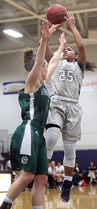 Azaria Nave of Lincoln goes up for a shot during Thursday's game with Northwest Missouri State at Jason Gym.