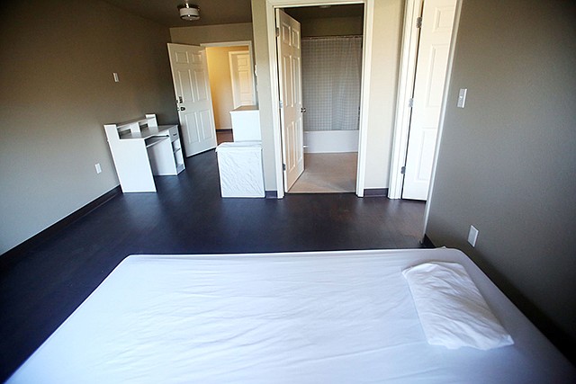 A furnished bedroom is seen at HALO Home in the former Rickman Conference Center. The center provides living quarters for homeless teens for up to 24 months with the ultimate goal of fostering independence. HALO Home opened in Jefferson City last week.