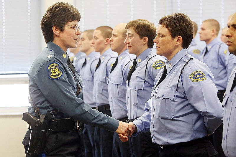Lt. Col. Sandy Karsten shakes hands with recruits at the Missouri Highway Patrol Headquarters in Jefferson City on Wednesday, Feb. 1, 2017. 