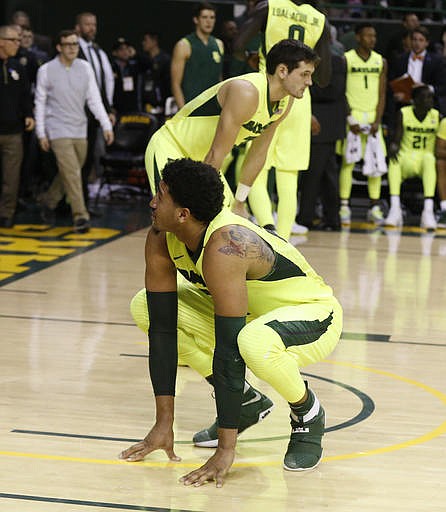 Baylor guard Ishmail Wainright, left, and Baylor guard Jake Lindsey, rear, react to their loss to Kansas State following an NCAA college basketball game, Saturday, Feb. 4, 2017, in Waco, Texas.