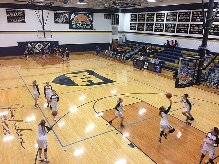 Eugene and Stoutland warm up for their girls basketball match Saturday, Feb. 4, 2017, at the Central Bank Shootout at Rackers Fieldhouse in Jefferson City.