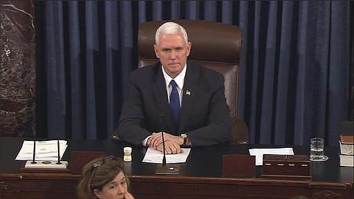 In this image from video, provided by Senate Television shows Vice President Mike Pence presiding over the Senate on Capitol Hill in Washington, Tuesday, Feb. 7, 2017, during the Senate's vote on Education Secretary-designate Betsy DeVos. The Senate confirmed DeVos with Pence breaking a 50-50 tie.