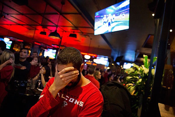 Michael Mazza reacts Sunday night in Atlanta after the Patriots scored late in the fourth quarter to tie the Falcons in Super Bowl LI in Houston.