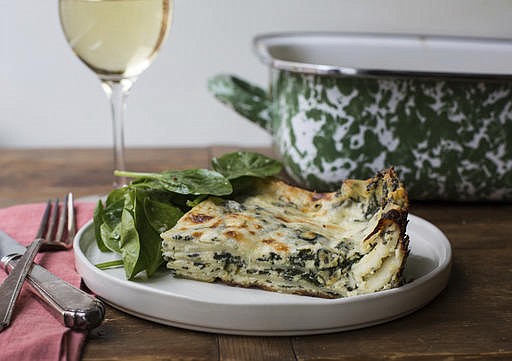 This November 2016 photo shows white and green spinach lasagna in New York. This dish is from a recipe by Katie Workman.