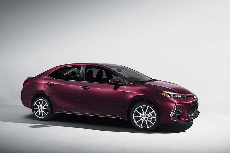 This photo provided by Toyota shows the 2017 Toyota Corolla 50th anniversary special edition. Toyota is marking 50 years of its stalwart and economical Corolla sedan with new styling, an upgraded interior, standard backup camera and more safety features than ever.
