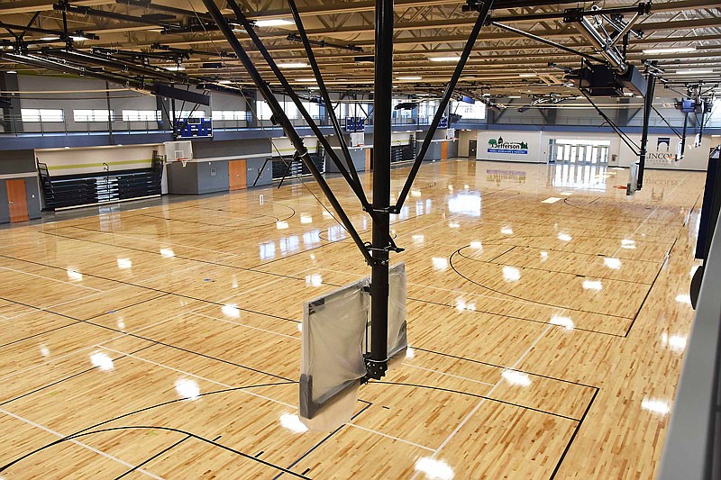 The 22,000-square-foot gymnasium in the Wellness Center is surrounded by an elevated running-walking track.