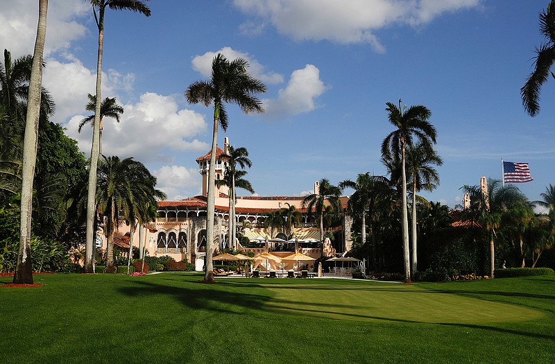 In this Nov. 27, 2016 file photo, Mar-a-Lago is seen from the media van window in Palm Beach, Fla. Trump has described the sprawling Mar-a-Lago property as the Winter White House and has spent two weekends there this month.  