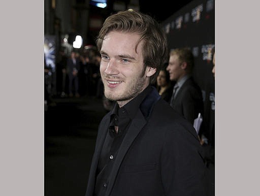  In this Oct. 28, 2013 file photo, YouTube star Felix Kjellberg, aka PewDiePie, arrives at the premiere of "Ender's Game" in Los Angeles. 