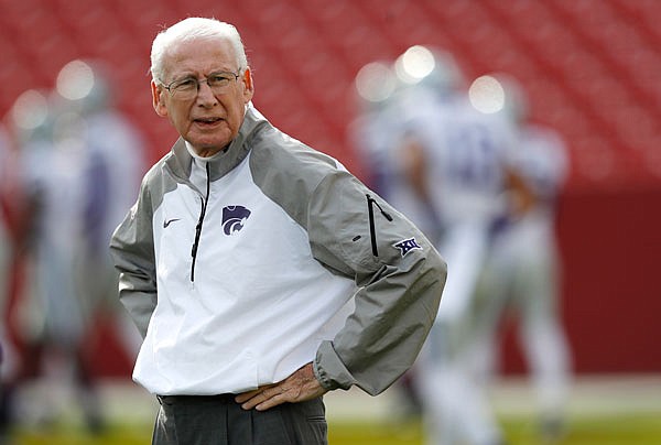 In this Oct. 29, 2016, file photo, Kansas State coach Bill Snyder stands on the field before a game against Iowa State in Ames, Iowa.