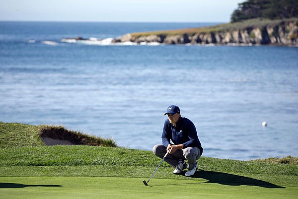 Jordan Spieth looks across the fourth green of the Pebble Beach Golf Links during Sunday's final round of the AT&T Pebble Beach National Pro-Am in Pebble Beach, Calif.