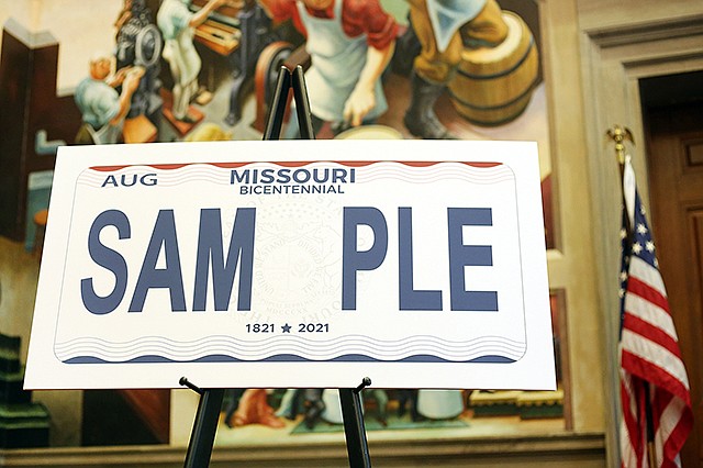 The new license plate design to be used for Missouri's Bicentennial is seen Tuesday in the House Lounge at the Capitol. Missourians will receive the new plates no later than 2019.