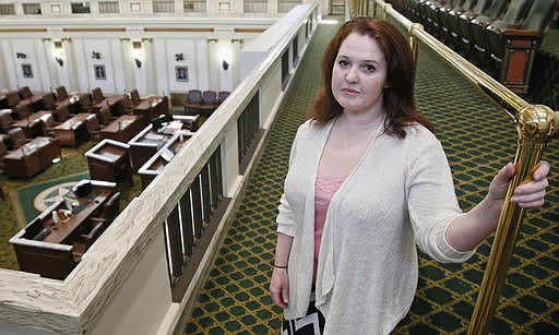 Carol Johnson poses for a photo in the House gallery in the Capitol in Oklahoma City, Thursday, Feb. 9, 2017. Johnson, who landed a position as a legislative assistant in the Oklahoma House of Representatives, has accused state Rep. Dan Kirby, of sexual harassment. Kirby, 58, resigned last week in the face of likely expulsion after Johnson testified before an investigating panel. 