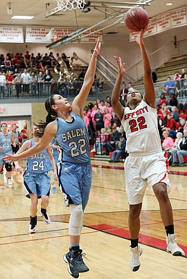 Sydney Crockett of Jefferson City goes up for a basket during Tuesday night's game against Salem at Fleming Fieldhouse.