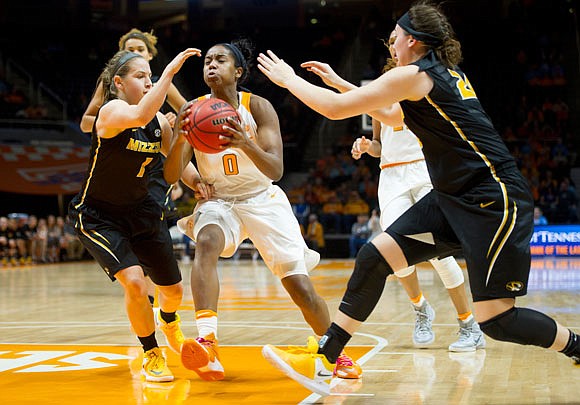 Missouri's Lianna Doty (left) tries to slow Tennessee's Jordan Reynolds drive to the basket during a game earlier this month in Knoxville, Tenn.