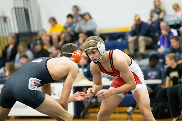 Peter Kuster is one of Jefferson City's five individual district champions among its 10 qualifiers for the Class 4 state wrestling tournament.