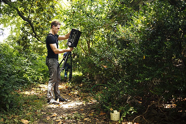 Microsoft researcher Ethan Jackson sets up a trap for mosquitoes in 2016 in Harris County, Texas. A new high-tech version trap is promising to catch the bloodsuckers while letting friendlier insects escape and even record the exact weather conditions when different species emerge to bite.