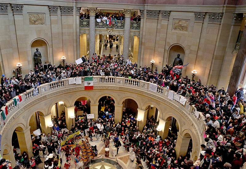 A large crowd of "A Day Without Immigrants," participants filled much of the inside of the Minnesota State Capitol Thursday, Feb. 16, 2017, in St. Paul, Minn. Immigrants around the U.S. stayed home from work and school Thursday to demonstrate how important they are to America's economy and way of life, and many businesses closed in solidarity, in a nationwide protest called A Day Without Immigrants. 