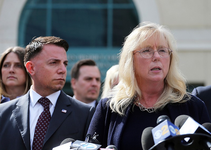 U.S. Attorney Eileen Decker, right, and FBI Special Agent Joshua Stone appear before reporters outside federal court in Riverside, Calif., Thursday, Feb. 16, 2017, after Enrique Marquez Jr. pleaded guilty to providing the high-powered rifles used to kill 14 people in the San Bernardino terror attack. The judge accepted his plea agreement with prosecutors. Under the plea deal, Marquez could face up to 25 years in prison. A sentencing hearing was scheduled for Aug. 21.