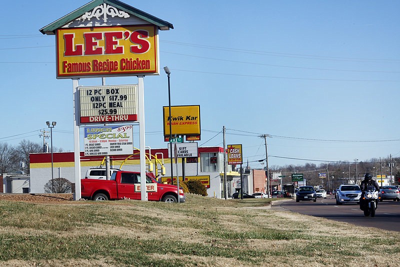 In this Feb. 17, 2017 photo, businesses are seen along the north side of a stretch of Missouri Boulevard with no sidewalk.