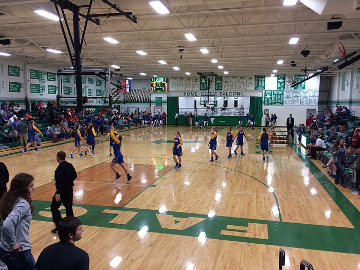 The Fatima Lady Comets and Hermann Lady Bearcats warm up for their Class 3 District 9 tournament basketball game on Monday, Feb. 20, 2017 at Blair Oaks in Wardsville. 