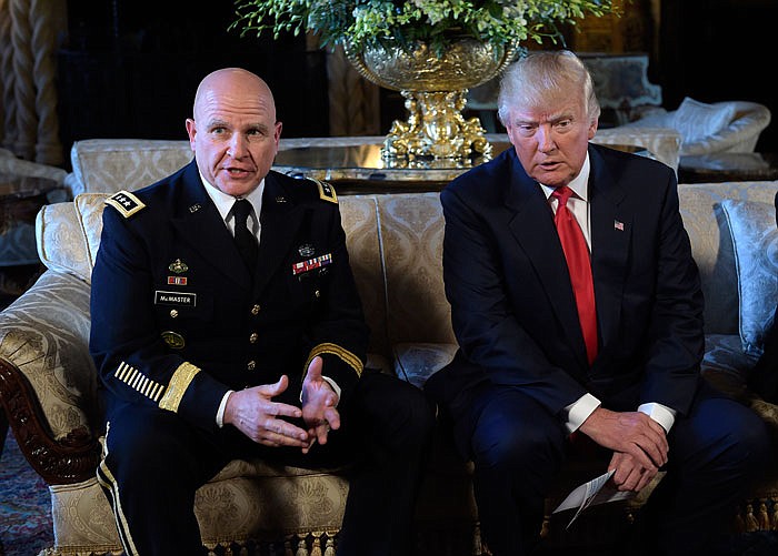 Army Lt. Gen. H.R. McMaster, a prominent military strategist known as a creative thinker, sits with President Donald Trump after being named national security adviser,