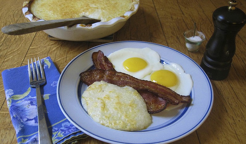 This Jan. 31, 2017 photo shows cheesy baked grits in New York. This dish is from a recipe by Sara Moulton. 