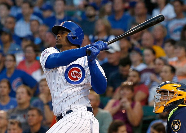 In this Aug. 17, 2016, file photo, Jorge Soler of the Cubs watches his three-run home run during the first inning of a game against the Brewers in Chicago.