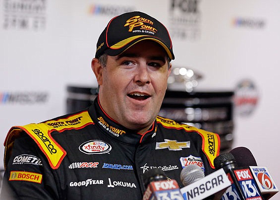 Brendan Gaughan speaks Wednesday at Daytona 500 media day at Daytona International Speedway in Daytona Beach, Fla.