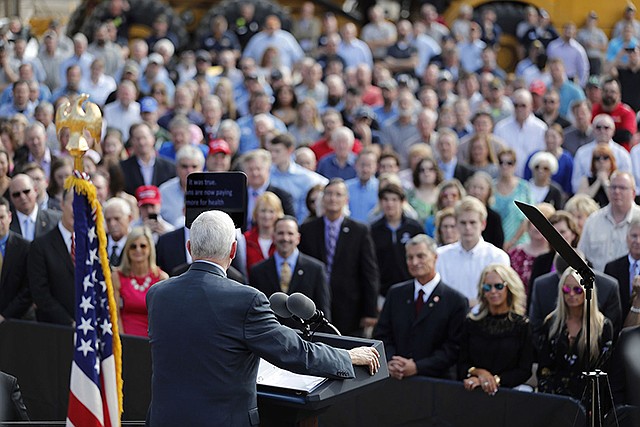 Vice President Mike Pence speaks Wednesday at Fabick Cat, a family-owned equipment and engine dealer in Fenton.